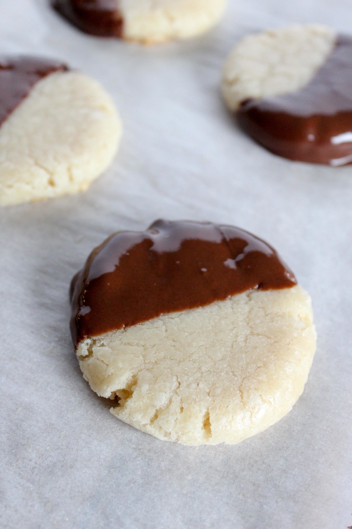 melted chocolate on half of a shortbread cookie