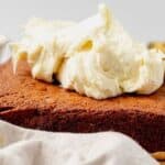 cream cheese frosting on top of gluten-free banana cake