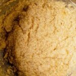 gluten free banana cake batter in a mixing bowl