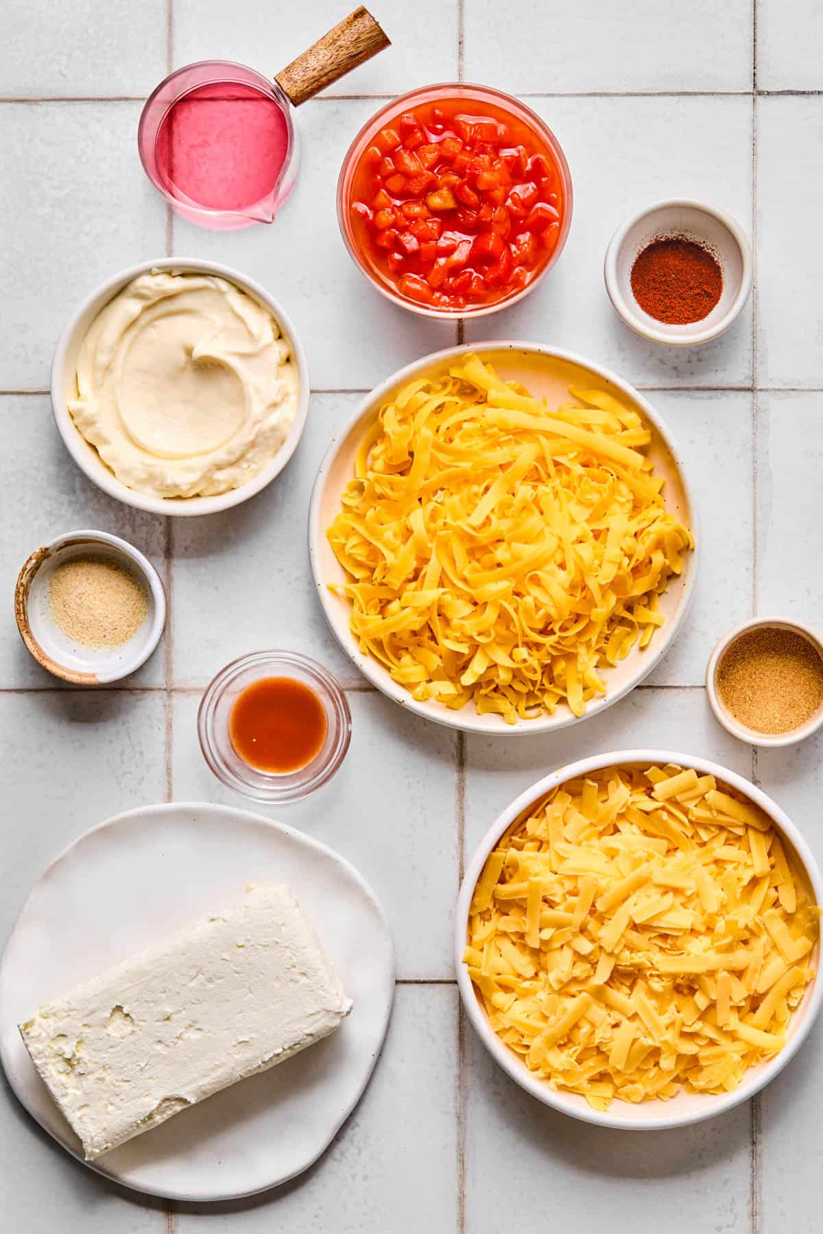 ingredients for pimento cheese dip laid out on a counter