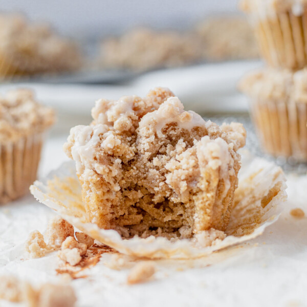 cinnamon coffee cake muffin with a bite taken out
