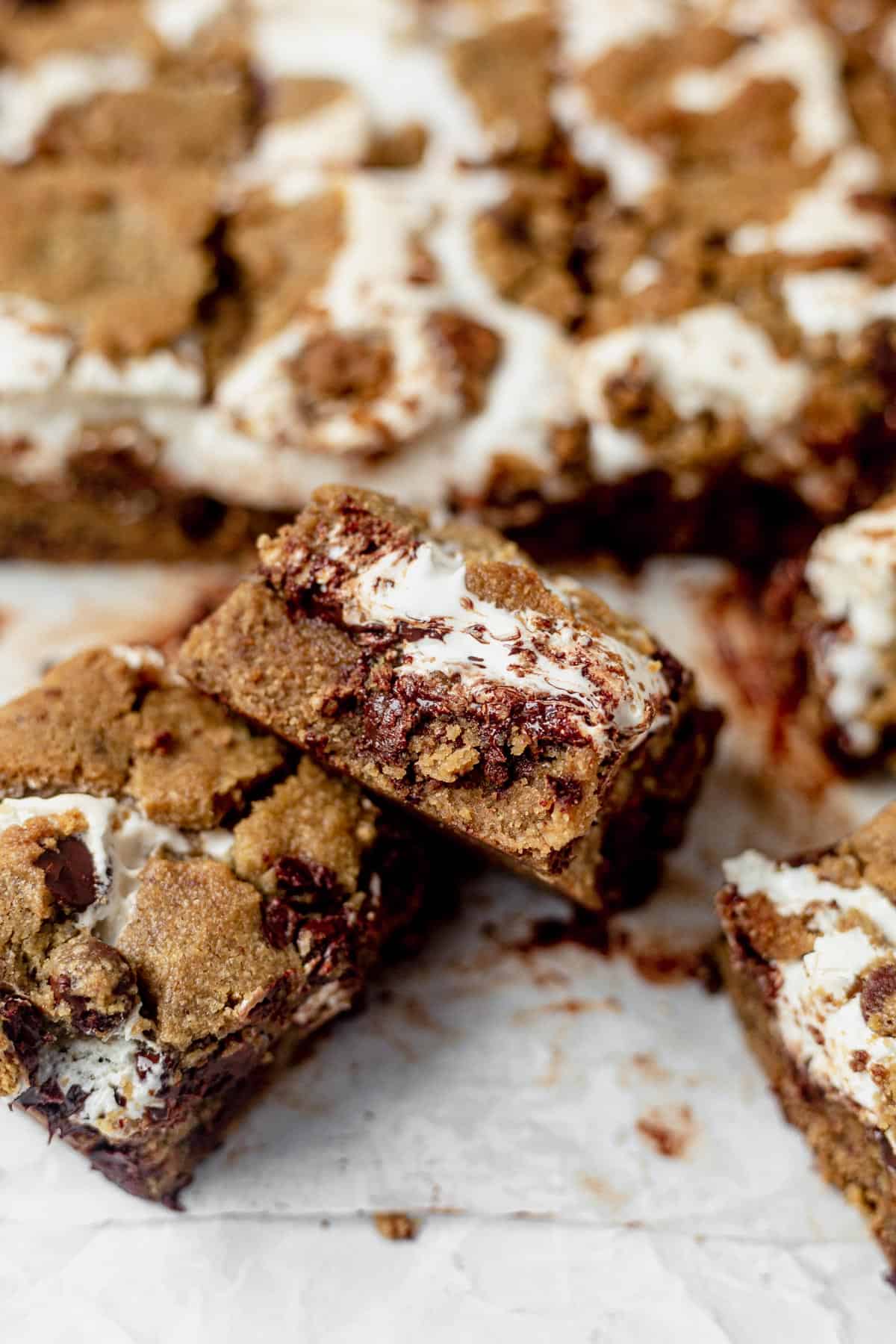 baked smores cookie bars on parchment paper