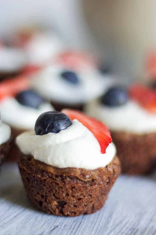The bite-sized desserts, patriotic recipes and Fourth of July celebrations are upon us! And these mini patriotic brownies fit the bill. With just the right amount of chocolate and chewiness, these little guys satisfy chocolate cravings in one bite. And the sweet topping with fresh fruit is just perfect, and I couldn't love it more.