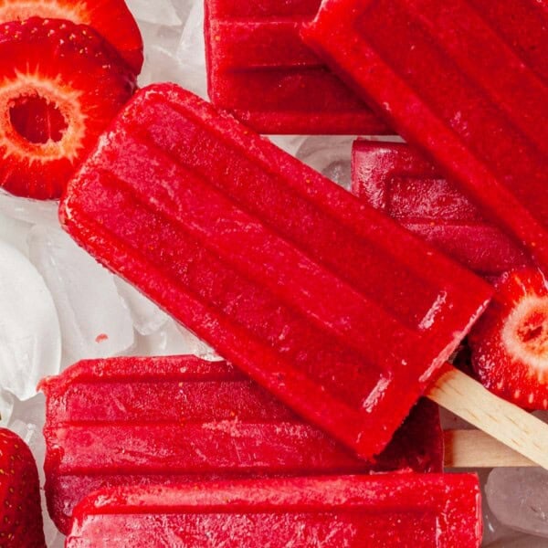 strawberry popsicles on a platter
