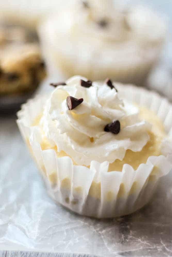 Chocolate chip cookie dough cheesecake bites! These no bake bites are filled with delicious ingredients. The bottom layer is edible cookie dough and the to player is cheesecake made with vanilla pudding. This recipe will impress everyone!