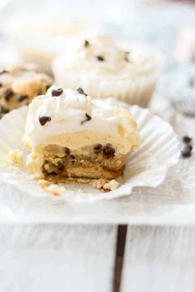 Chocolate chip cookie dough cheesecake bites! These no bake bites are filled with delicious ingredients. The bottom layer is edible cookie dough and the to player is cheesecake made with vanilla pudding. This recipe will impress everyone!
