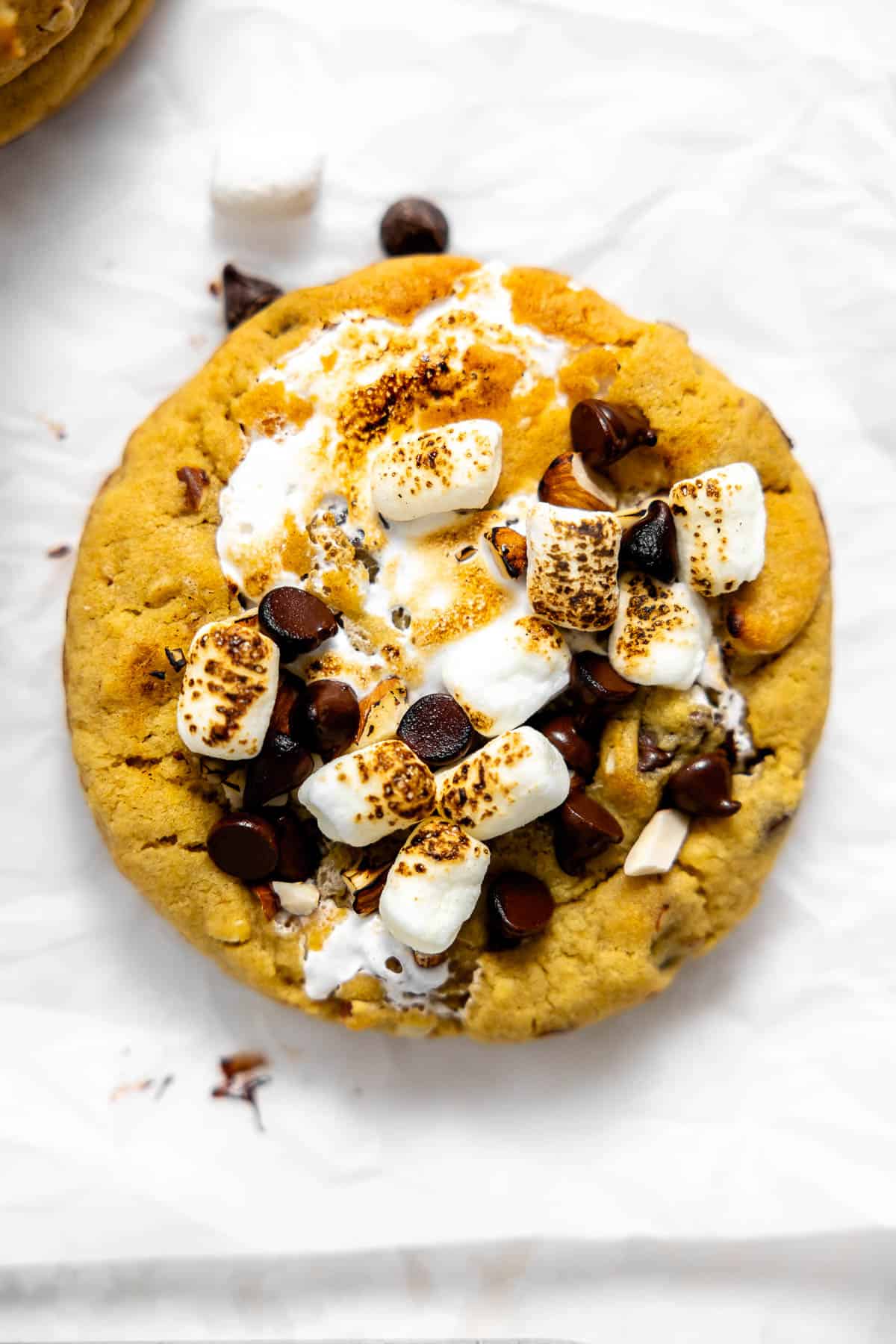 toasted marshmallow rocky road cookie on parchment paper