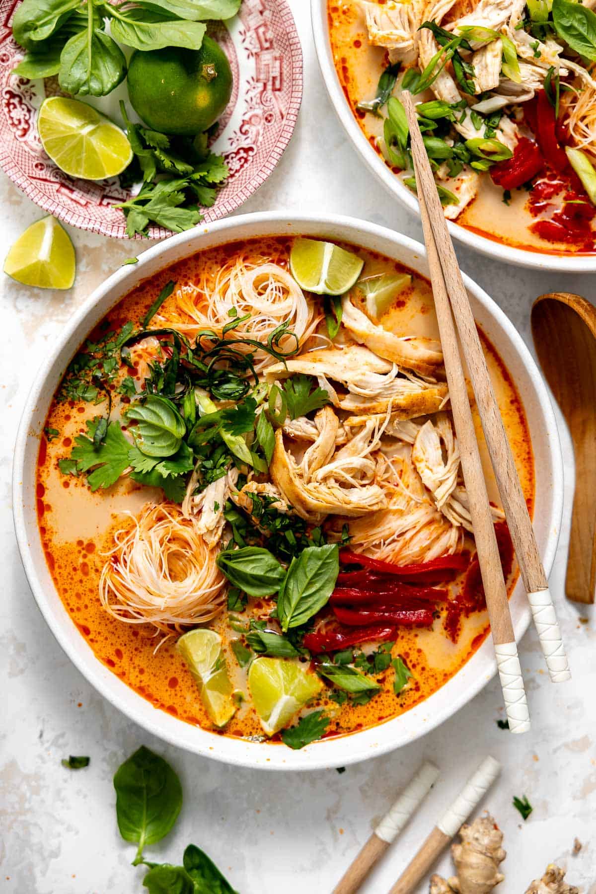 coconut curry noodle soup in a bowl with pho toppings
