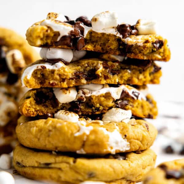 a stack of rocky road cookies on parchment paper