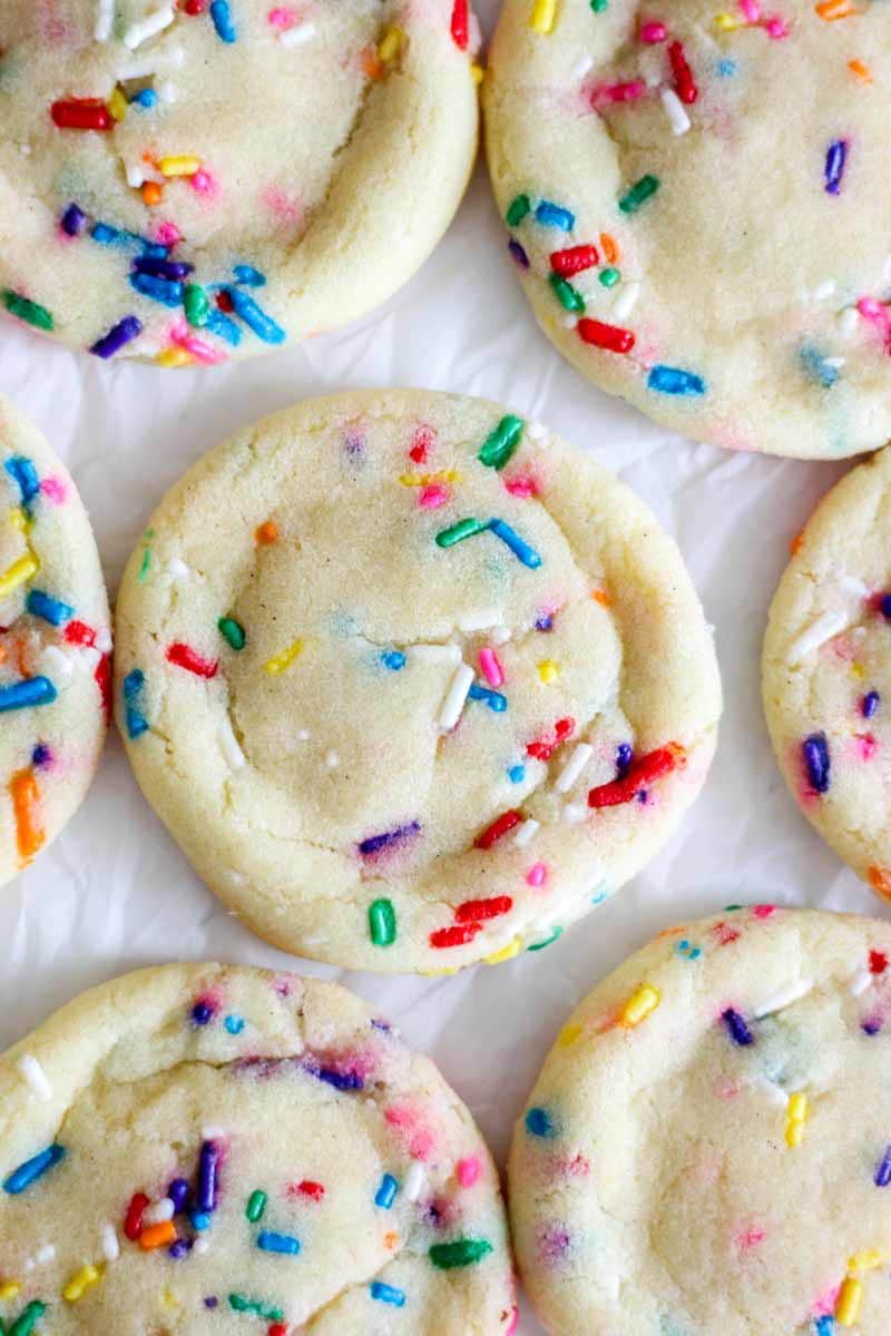 Easy and full of sprinkles, these Funfetti Sugar Cookies are the perfect Christmas cookie or birthday cookie and only require one bowl. Mix all of the classic ingredients like butter, sugar, flour and eggs and add sprinkles and almond extract for the perfect funfetti cookie recipe. They're simple and delicious!