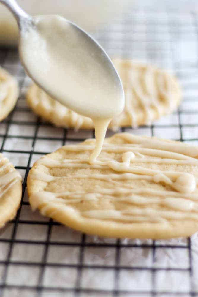Soft and chewy, these maple sugar cookies are easy to make and absolutely delicious. Make them ahead of time or make them with your kids for a from holiday treat. The maple sugar icing is the perfect touch.