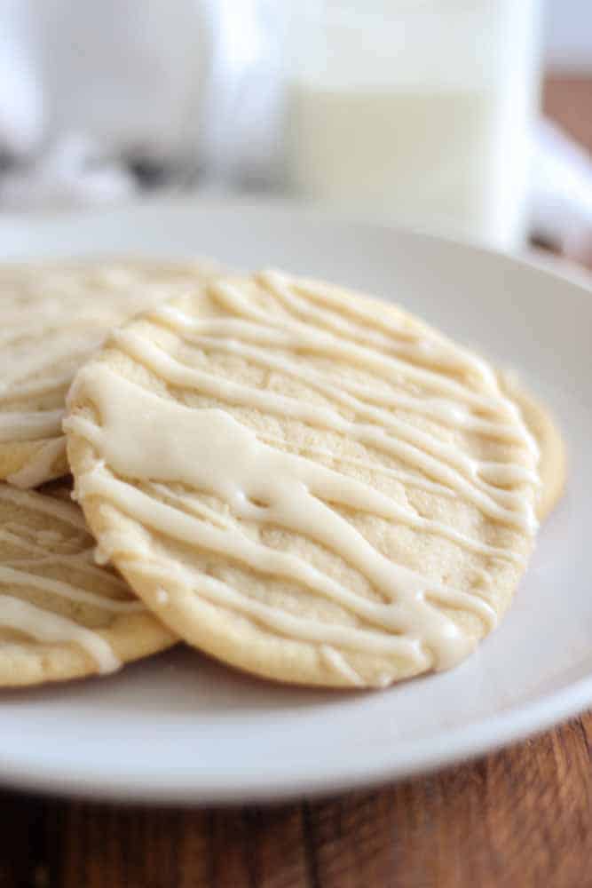 Soft and chewy, these maple sugar cookies are easy to make and absolutely delicious. Make them ahead of time or make them with your kids for a from holiday treat. The maple sugar icing is the perfect touch.