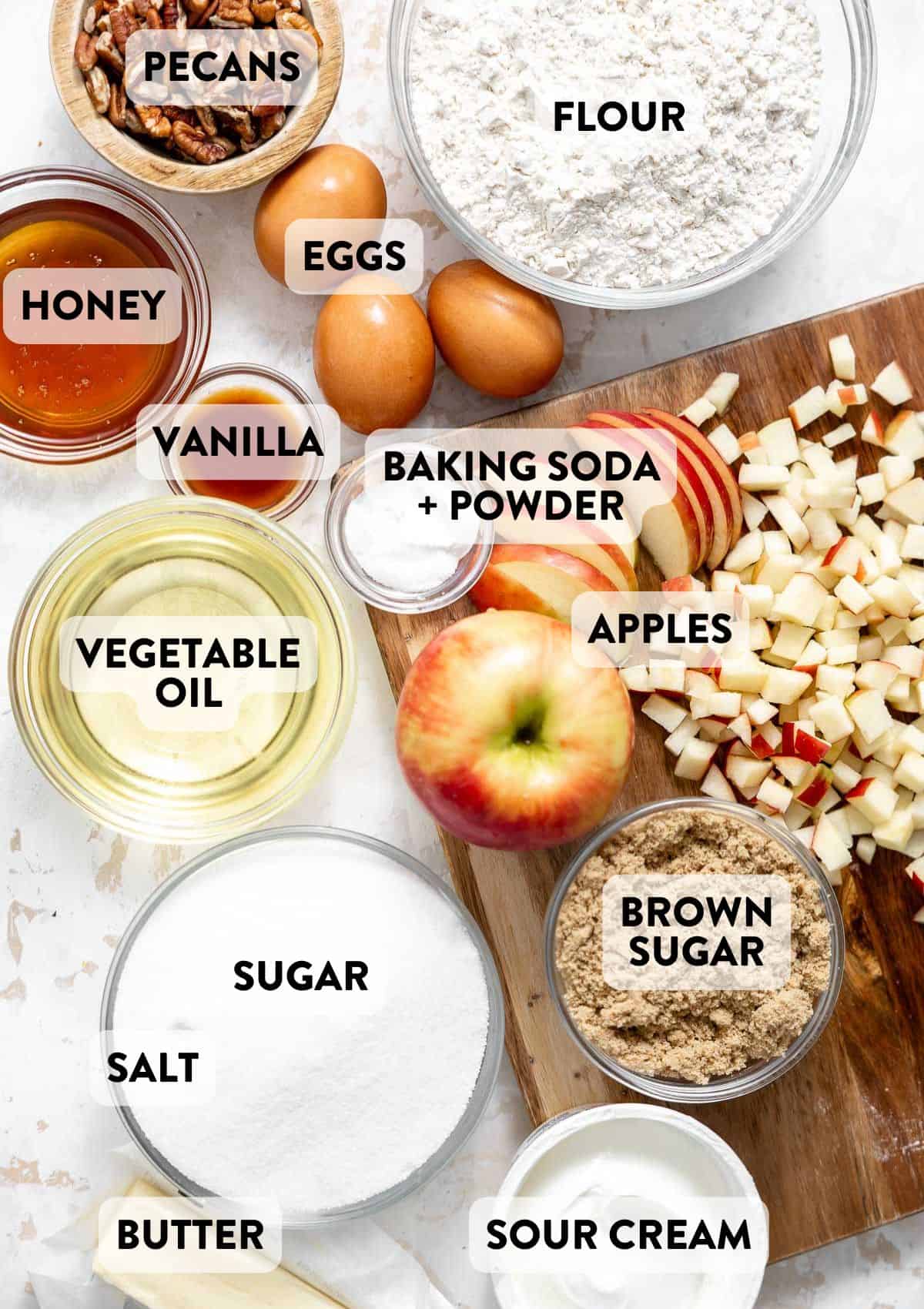 ingredients for apple cake on a countertop.