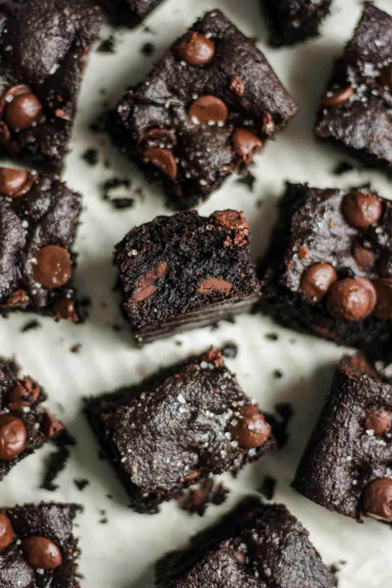 Thick and chewy, these paleo chocolate salted cookie bars are an easy dessert recipe that's guilt free and filled with lots of paleo chocolate.