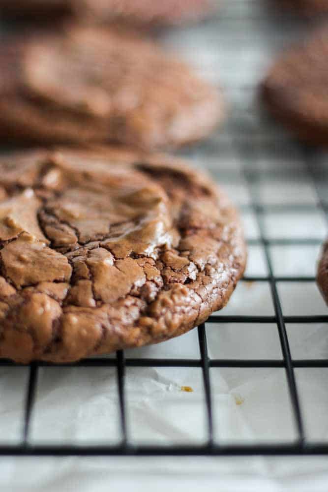Fudgy and full of chocolate flavor, these triple chocolate cookies will satisfy all the chocolate lovers in your life. They’re easy to make and taste and look just like flourless cookies. You can freeze them ahead of time for christmas cookie gifts or a holiday party and you have a homemade cookie recipe whenever you need them.