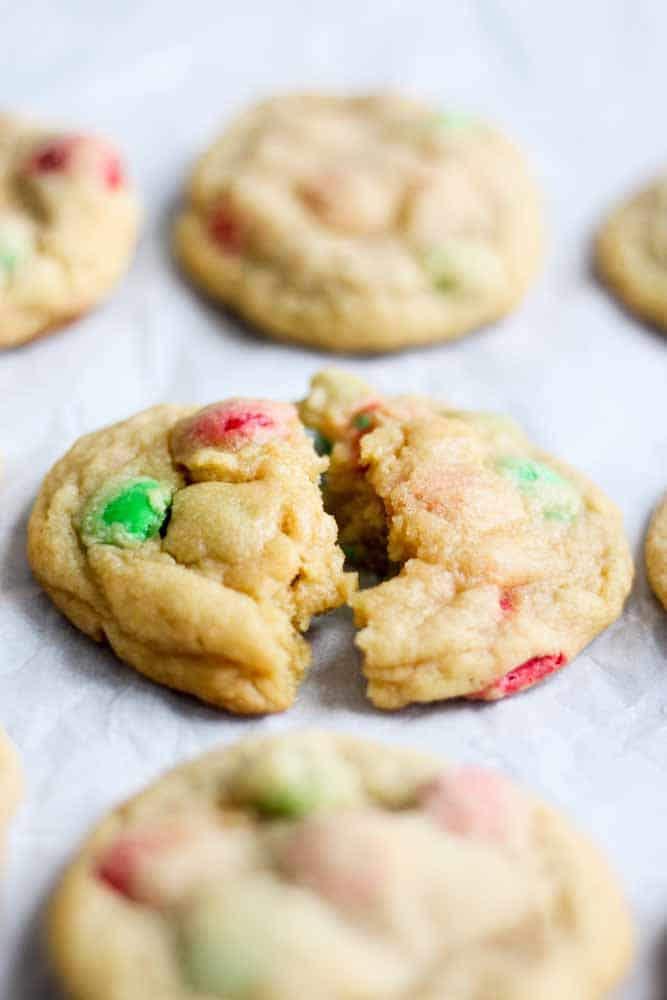 These soft and chewy M&M cookies are the best Christmas cookie you will make this year. They're made with butter and sugar, then eggs, vanilla extract and vanilla pudding are mixed in with the dry ingredients. Add any color of M&M for a festive holiday cookie. These red and green candies make these the best Christmas cookie recipe you will find. They stay soft and chewy for days! Store in the freezer for up to three months.