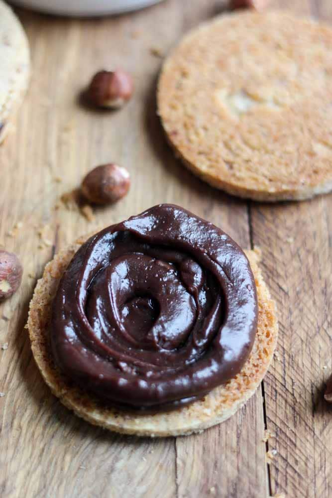 Buttery and filled with chocolate, this Hazelnut Shortbread cookie recipe is the perfect sandwich cookie for Christmas. Nutella desserts are the best and these cookies are filled with Nutella ganache. The hazelnut shortbread is nutty and perfect. Your friends and family (even the kids) will love them!