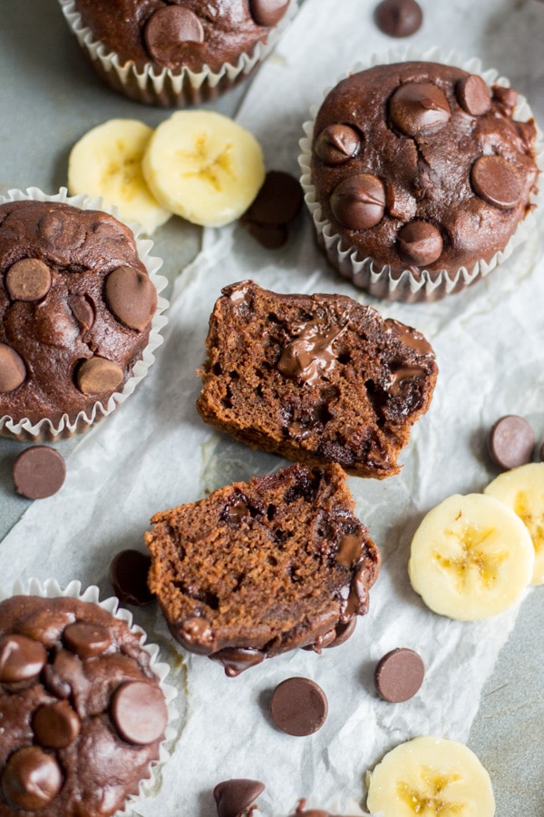 Healthy chocolate banana blender muffins! This muffin recipe is easy to make and gluten free. Mix the dry ingredients then blend all of the wet ingredients together. Fold in chocolate chips and bake until melted and gooey. They're also made with coconut oil and greek yogurt. They're the perfect magical chocolate muffin and so guilt free.