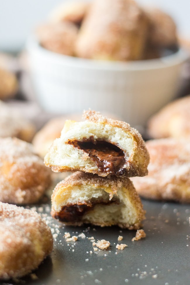 Soft and delicious, these cinnamon sugar pretzel bites are stuffed with nutella and are the perfect snack or dessert recipe for parties. 