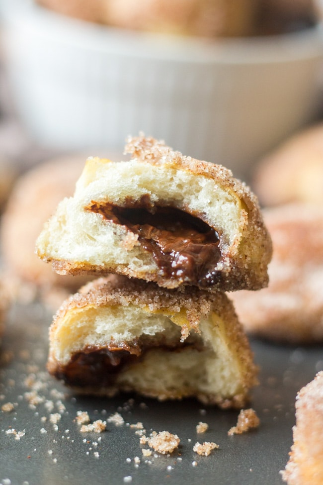 Soft and delicious, these cinnamon sugar pretzel bites are stuffed with nutella and are the perfect snack or dessert recipe for parties. 