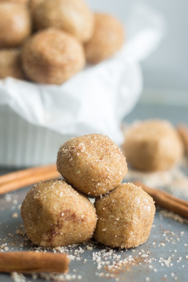 three snickerdoodle protein balls stacked together