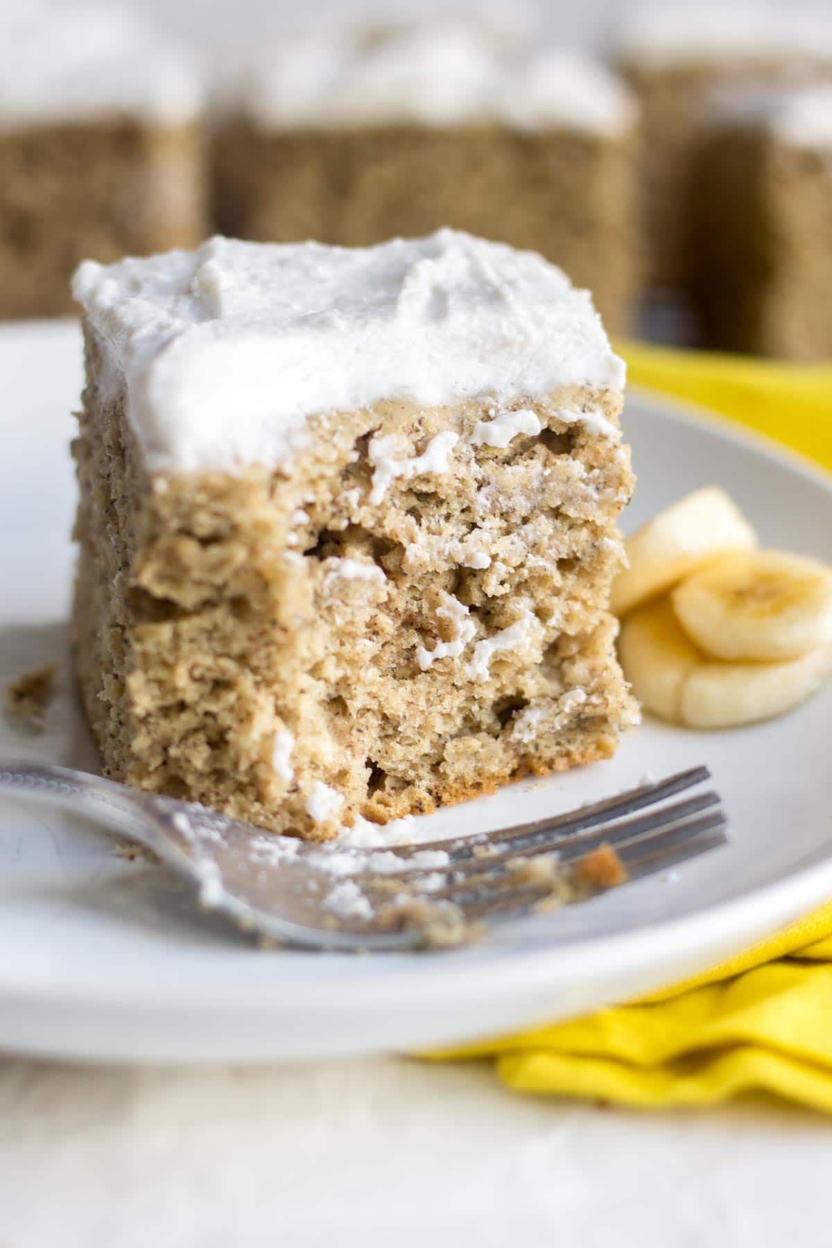 Healthy Banana Cake! You will no believe how easy and healthy is banana cake recipe is. It's oil free and refined sugar free and naturally sweet from the bananas. Top it with vegan coconut whipped cream frosting and your friends will be amazed! So moist and flavorful!