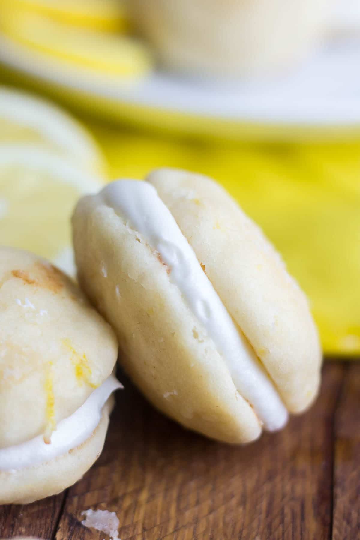 Sweet and tangy, these lemon whoopie pies are a cloud-like dessert you won't want to miss this spring. True to a whoopie pie, these are light and fluffy cake-like cookies surrounded by sweet cream cheese frosting. Perfect for spring celebrations!