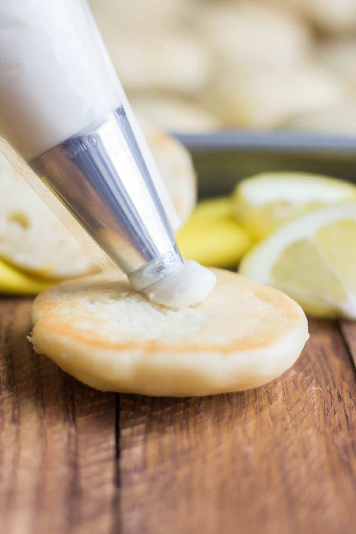 Sweet and tangy, these lemon whoopie pies are a cloud-like dessert you won't want to miss this spring. True to a whoopie pie, these are light and fluffy cake-like cookies surrounded by sweet cream cheese frosting. Perfect for spring celebrations!