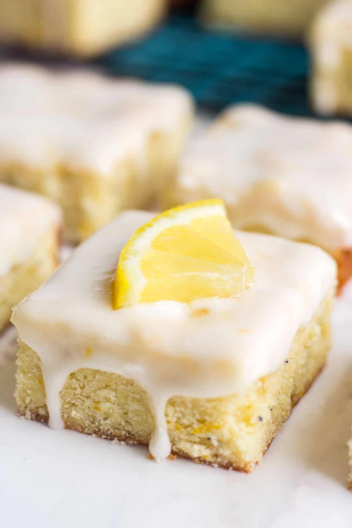 These glazed lemon poppy seed bars are a zingy lemon dessert! These bars are easy to make and are packed with some serious spring flavor. The lemon glaze will leave you wanting more.