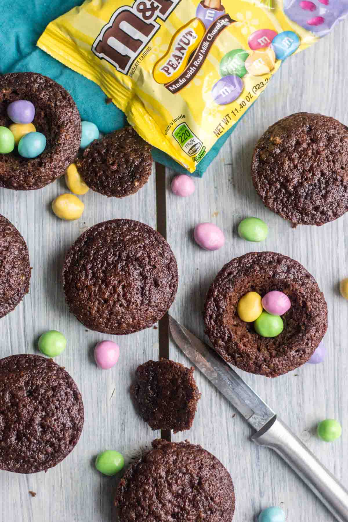 Light and fluffy chocolate cupcakes are topped with a sweet and creamy peanut butter frosting. Plus, there's a fun Easter surprise on the inside! These Chocolate Peanut Butter Piñata Cupcakes will surprise and delight all of your friends and family.