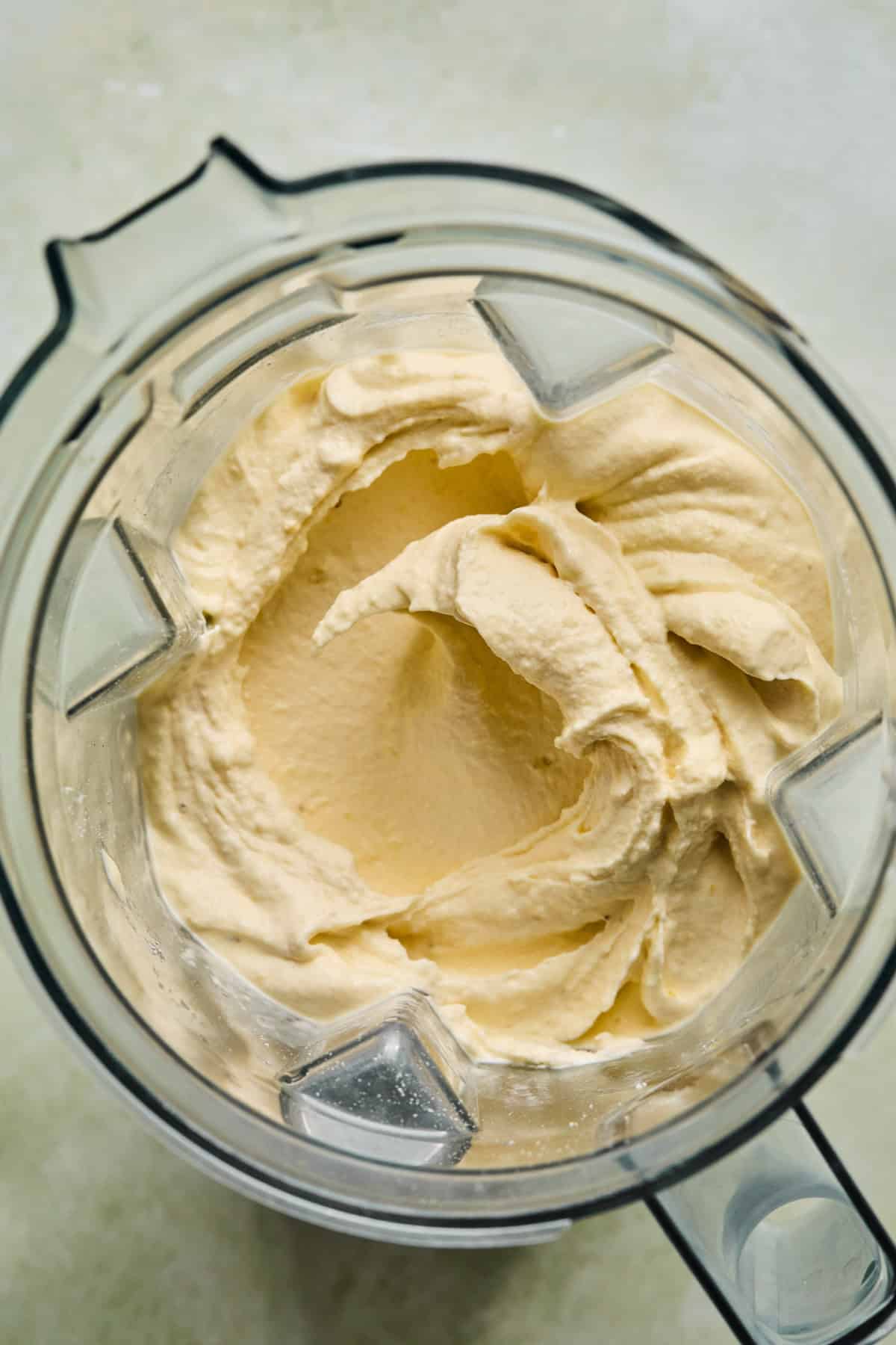 coconut smoothie ingredients combined in a blender