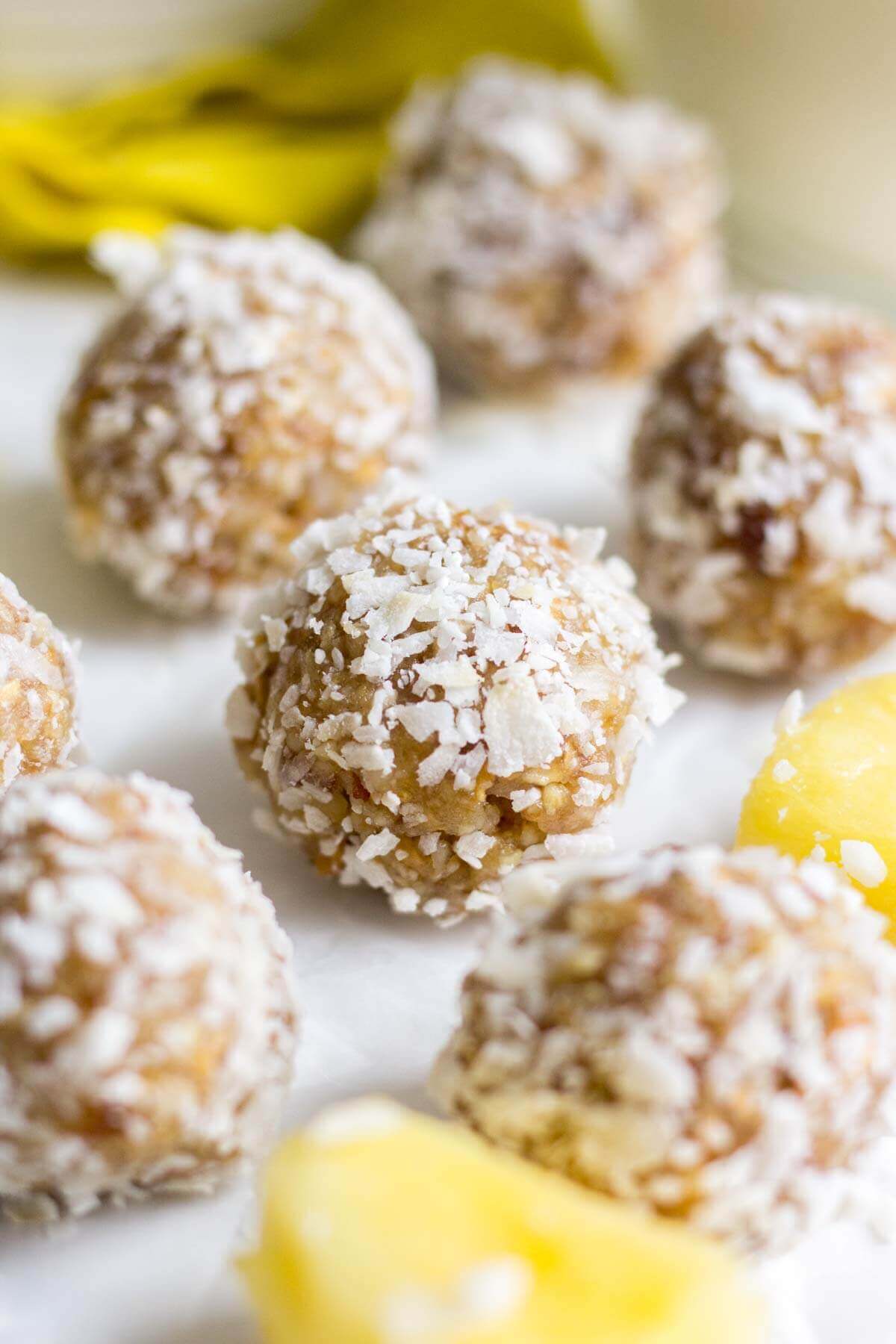 close up of pina colada energy bites on a counter