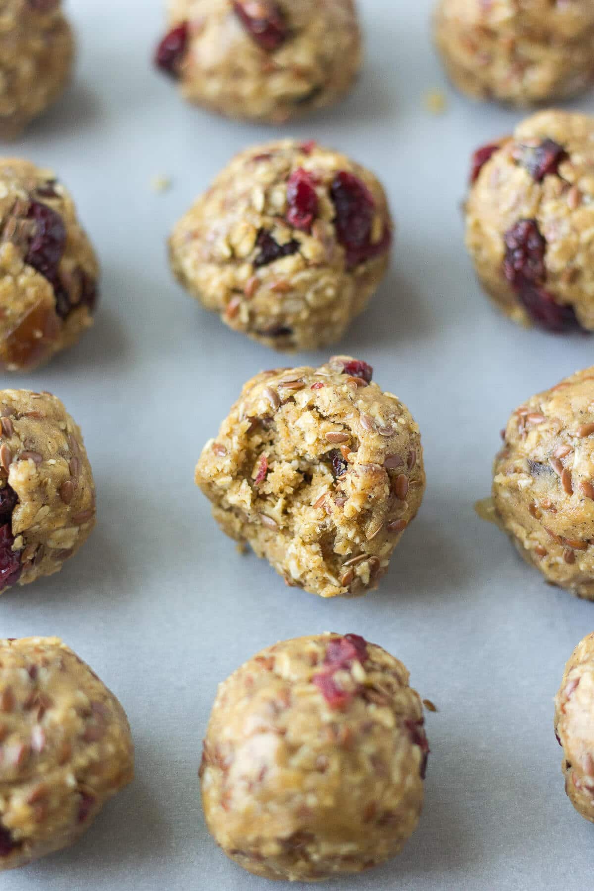 \PB & J Protein Balls lined up in rows of four on a cookie sheet