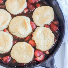 This roasted strawberry cobbler is the perfect healthy summer dessert. It's fresh and sweet and so easy to make. Not to mention it's vegan and refined sugar free.