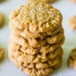 These flourless peanut butter cookies are made in less than 20 minutes! They don't include any flour so they're gluten free, plus there's no butter in this recipe either. You will love how delicious they are!