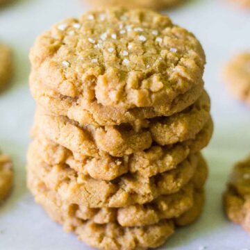 These flourless peanut butter cookies are made in less than 20 minutes! They don't include any flour so they're gluten free, plus there's no butter in this recipe either. You will love how delicious they are!