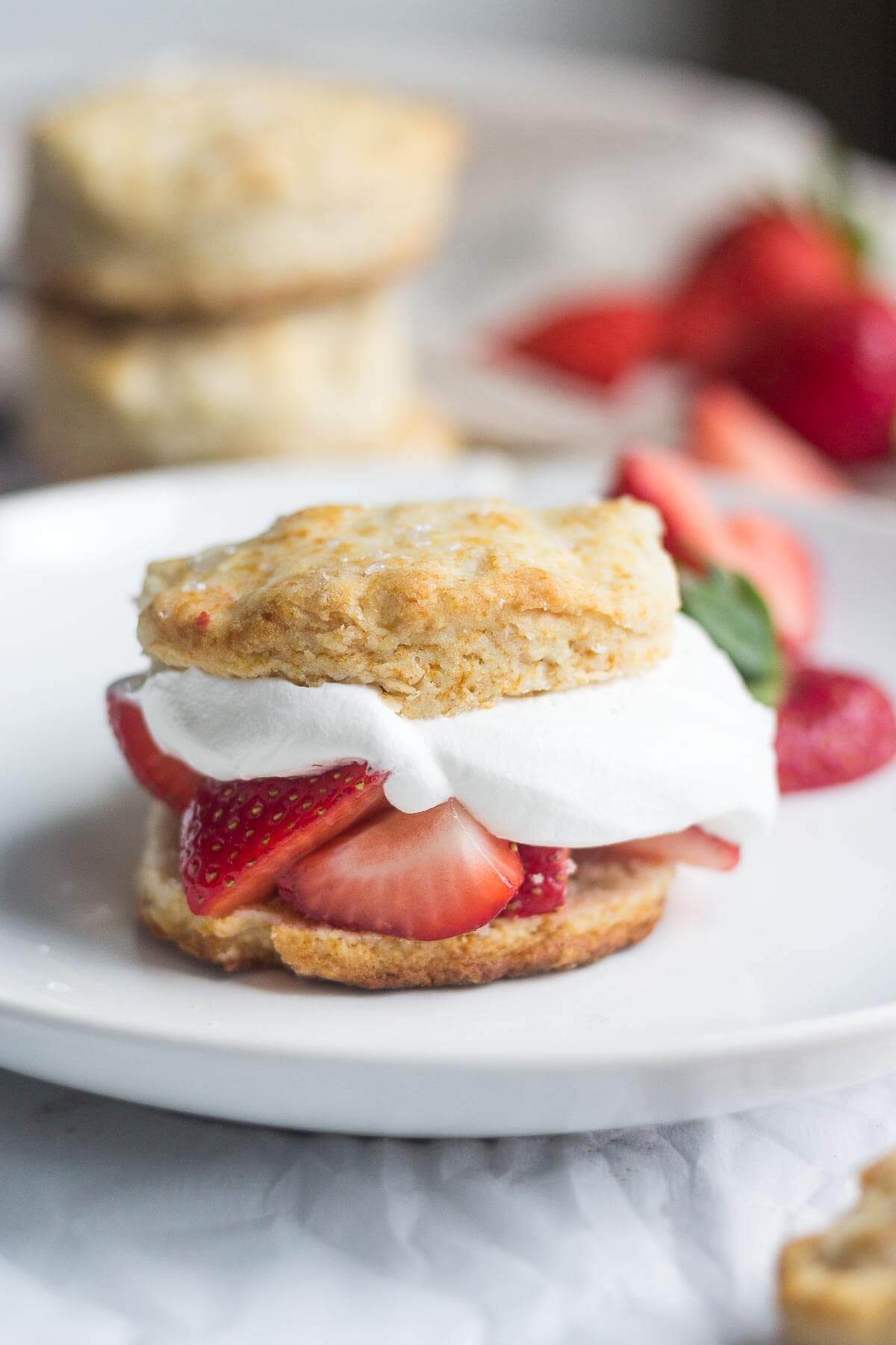 Healthy strawberry shortcake! Made with fresh fruit and real ingredients, this skinny strawberry shortcake is a guilt free dessert you can eat all summer long! 