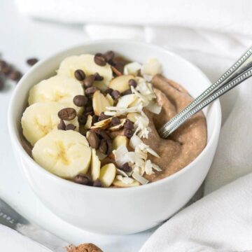 This mocha protein smoothie bowl has all your favorite breakfast flavors in one healthy bowl! It's rich, creamy and filled with chocolate and protein. You will love how easy it is to make!