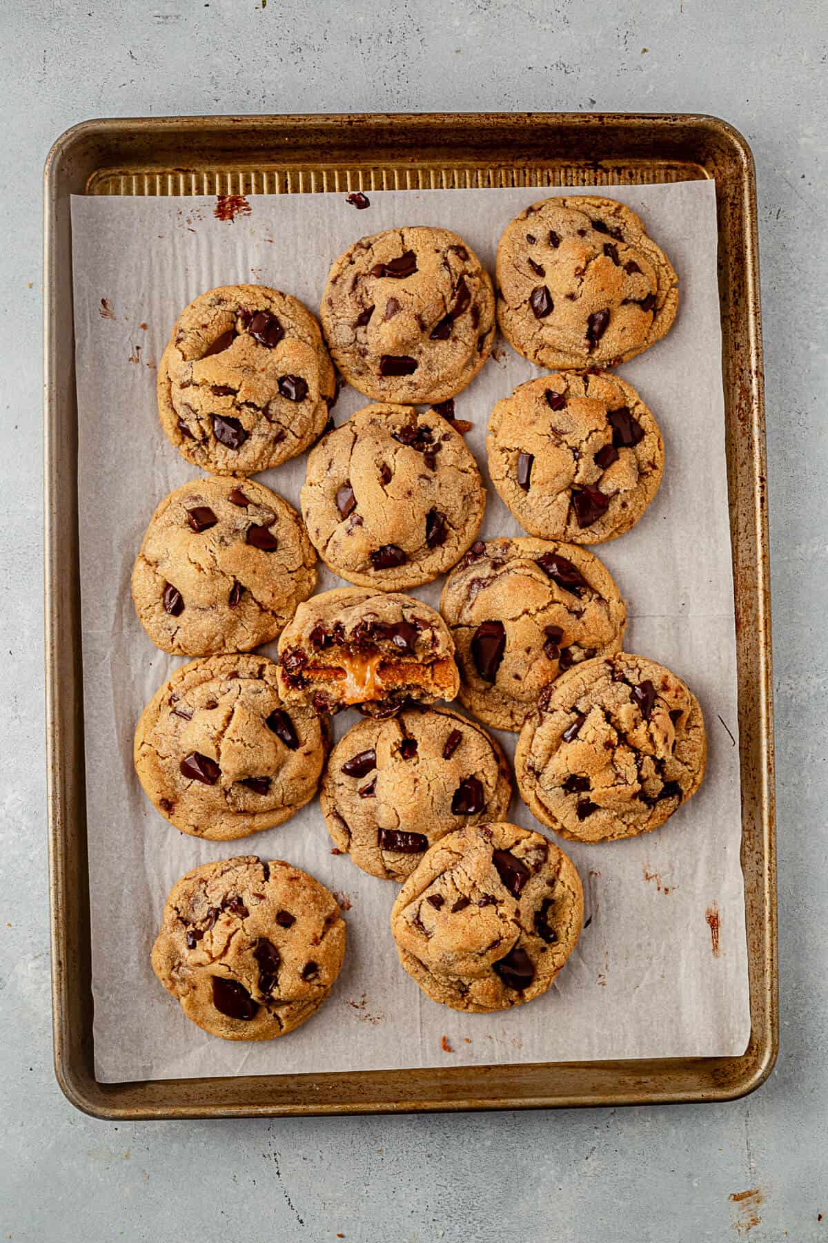 a cookie tray full of salted caramel chocolate chip cookies