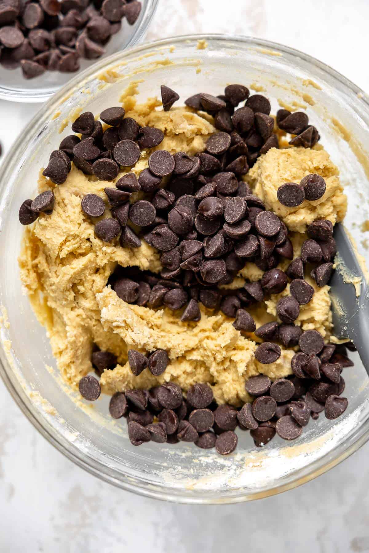 chocolate chip cookie dough in a mixing bowl.