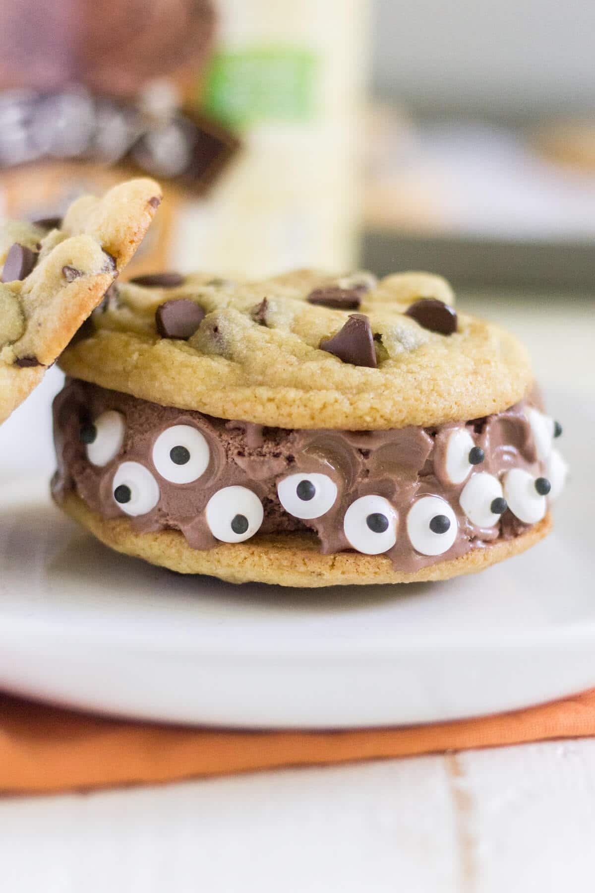 Spooky Monster Ice Cream Sandwiches are an easy Halloween treat for kids and adults alike! This Halloween recipe is a fun dessert for any spooky occasion, from a kid’s party to a trick-or-treating night in.