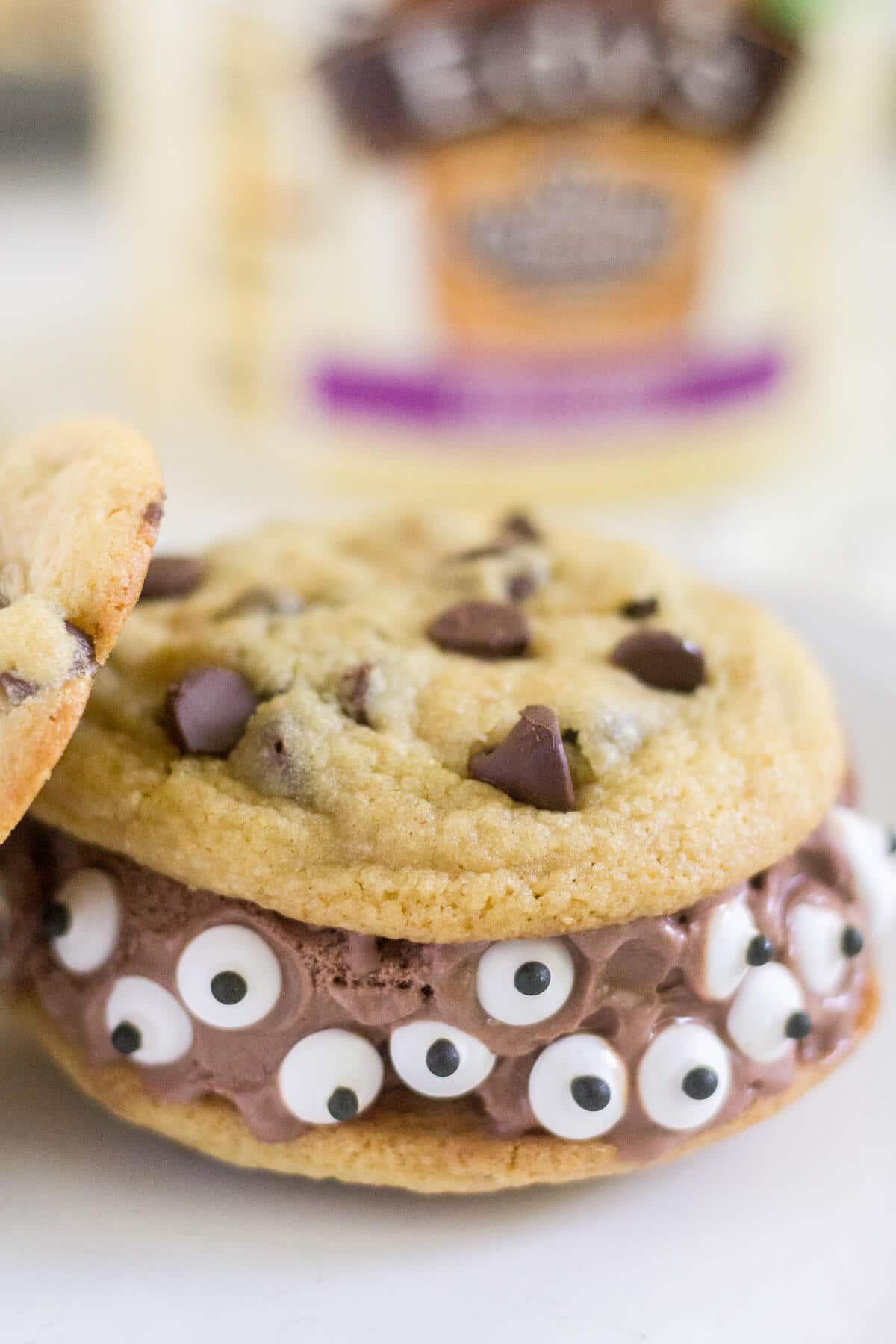 Spooky Monster Ice Cream Sandwiches are an easy Halloween treat for kids and adults alike! This Halloween recipe is a fun dessert for any spooky occasion, from a kid’s party to a trick-or-treating night in.