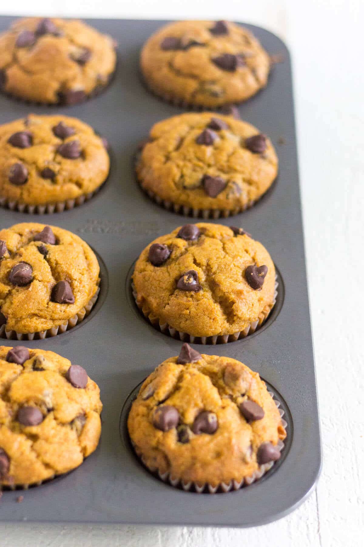 gluten free pumpkin muffins in a muffin tin