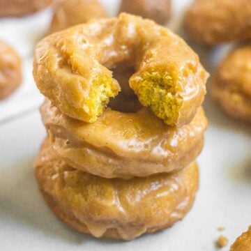 Get ready for these homemade old fashioned pumpkin donuts! They're cake like, filled with pumpkin spice and melt in your mouth. The sour cream and pumpkin puree make for a tasty breakfast recipe. Read more to learn how to make old fashioned pumpkin donuts!