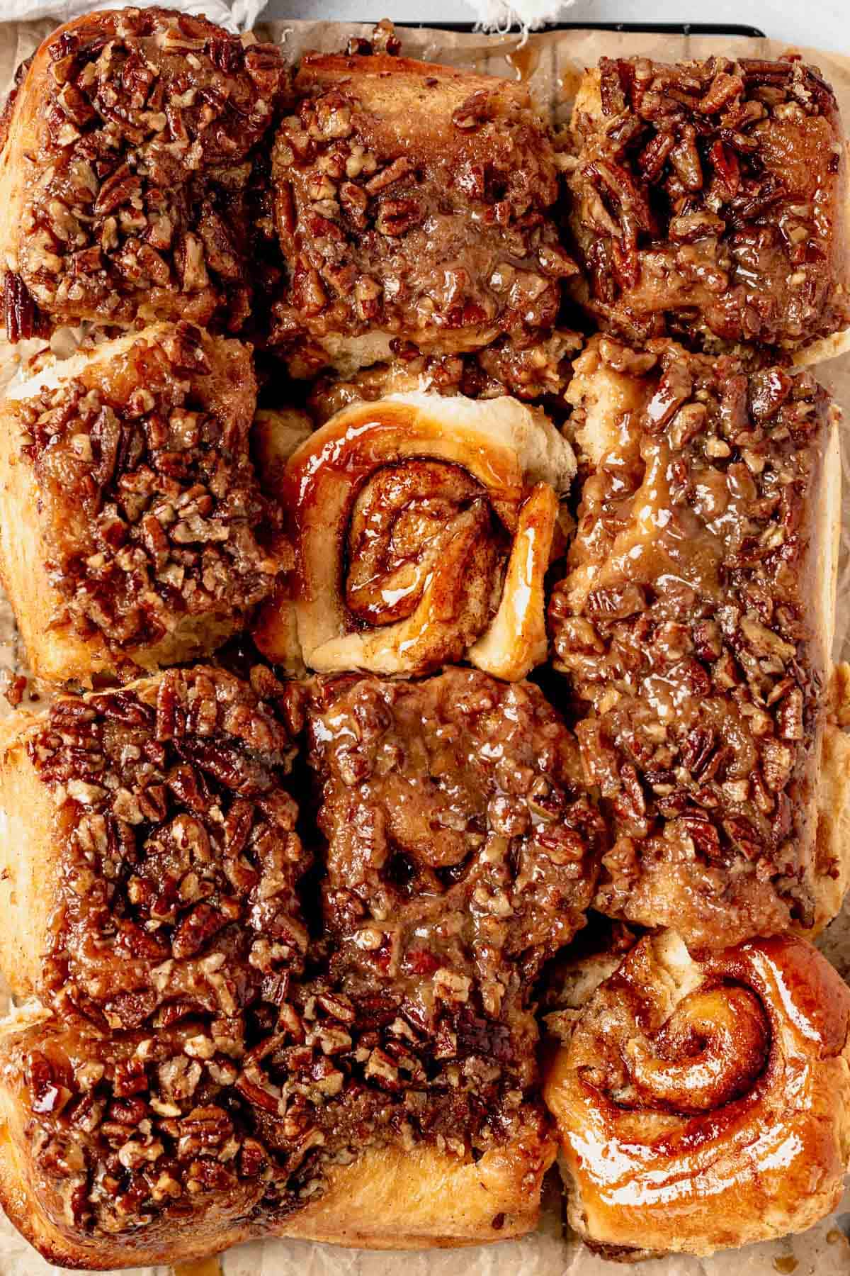 pecan sticky buns cooling on a rack