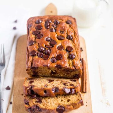 Healthy pumpkin banana bread is an easy and healthy recipe to make this fall! It's made with canned pumpkin, greek yogurt, coconut oil and optional chocolate chips for a healthy, but delicious pumpkin banana bread recipe.