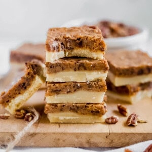 a stack of pumpkin pecan bars