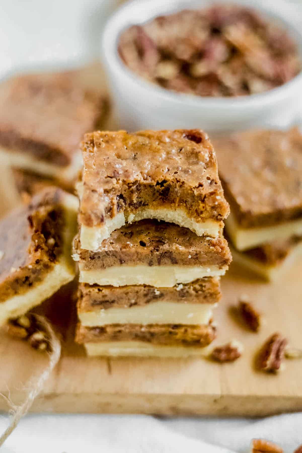 a bites taken out of a pumpkin pecan bar