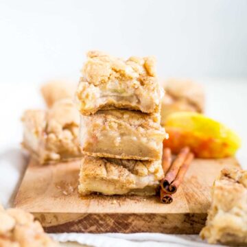 Sweet and gooey snickerdoodle apple pie bars are the perfect fall dessert. The base layer is a snickerdoodle bar topped with cinnamon-spice apple pie filling and topped with more snickerdoodle. It's delicious served warm with ice cream!