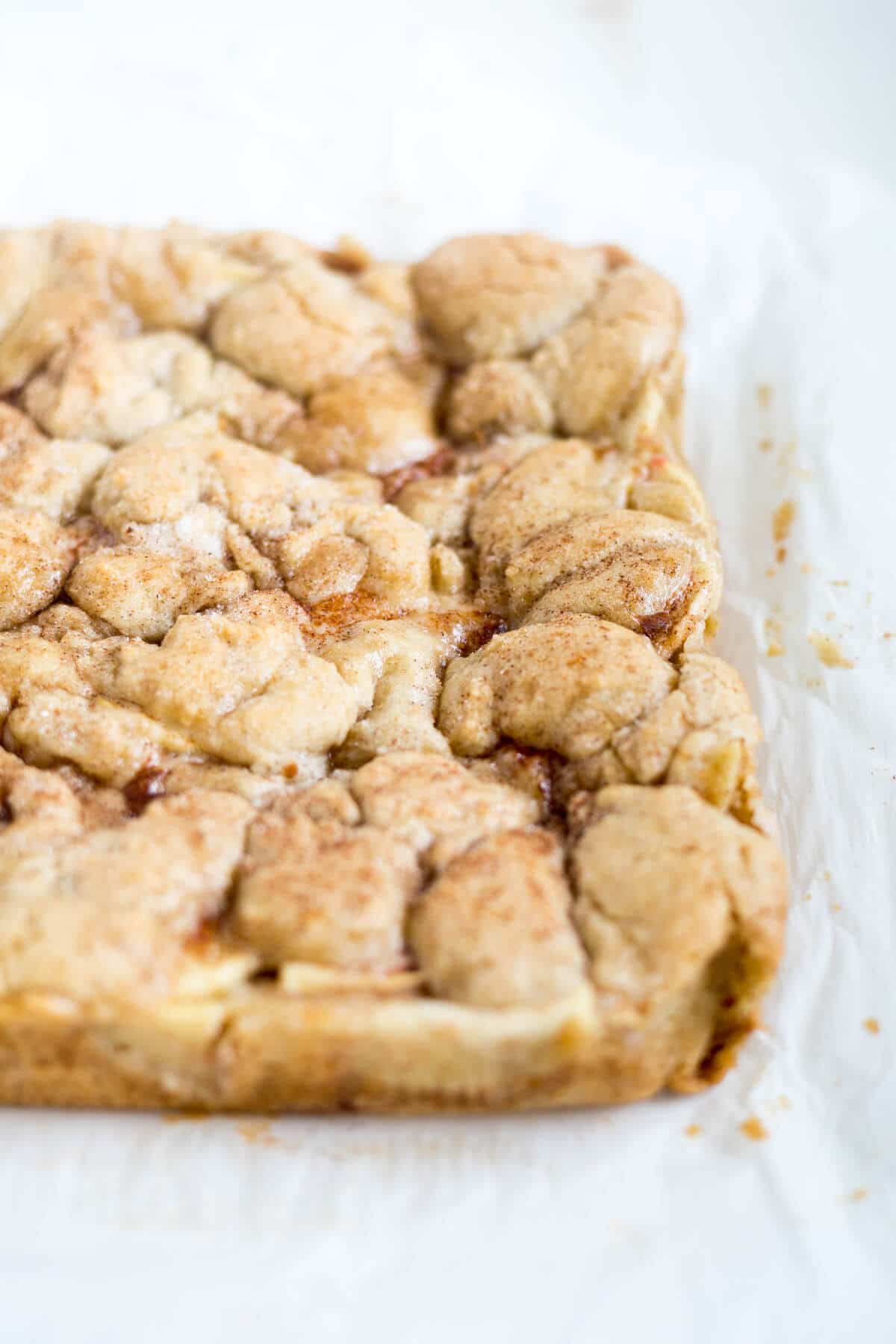 close up of full bar of Sweet and gooey snickerdoodle apple pie bars 